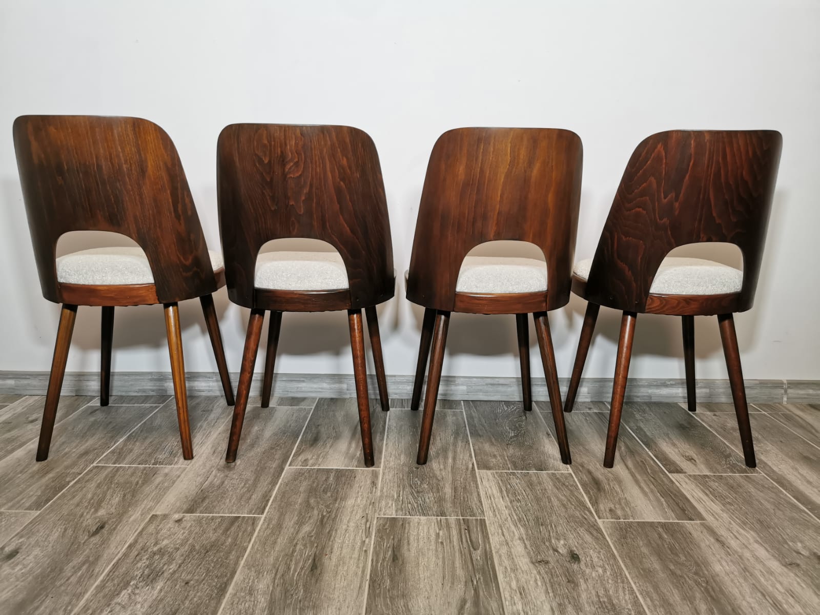 Dining chairs by Oswald Haerdtl