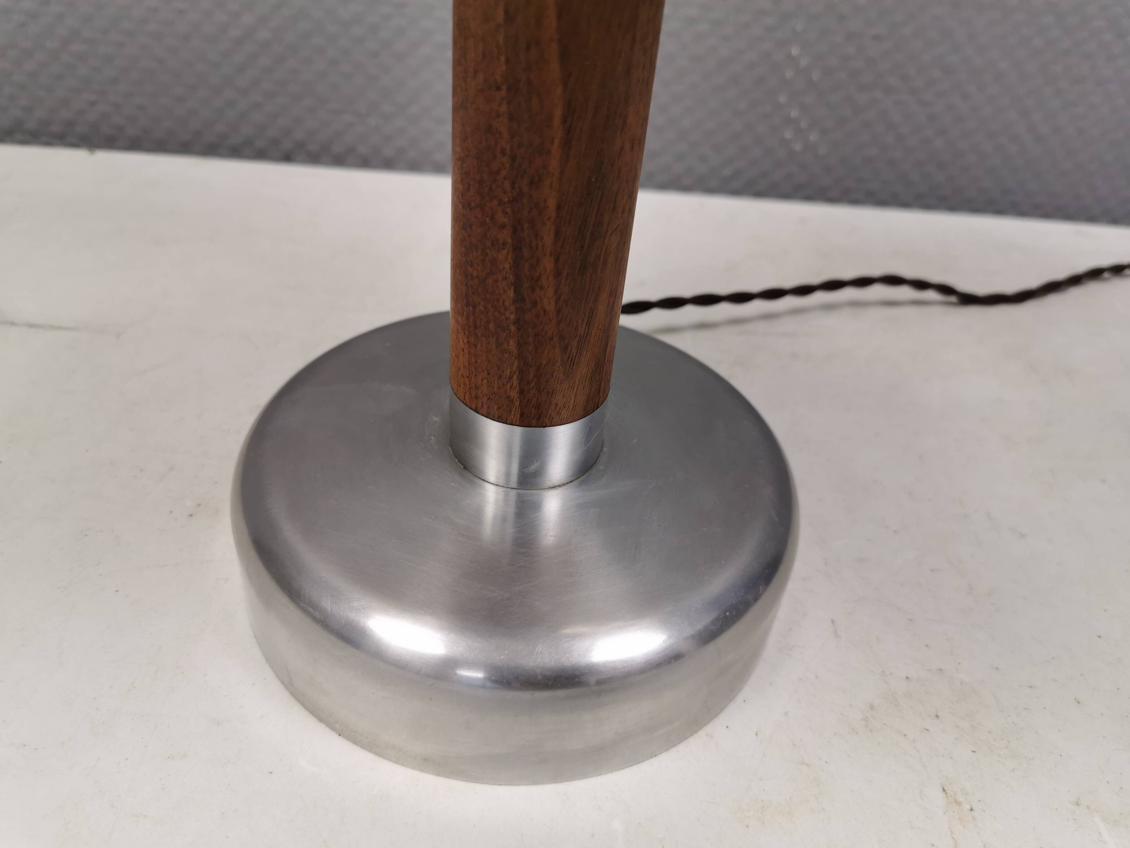 Table lamp with a teak ‘trunk’, silver-coloured metal base, acrylic shade