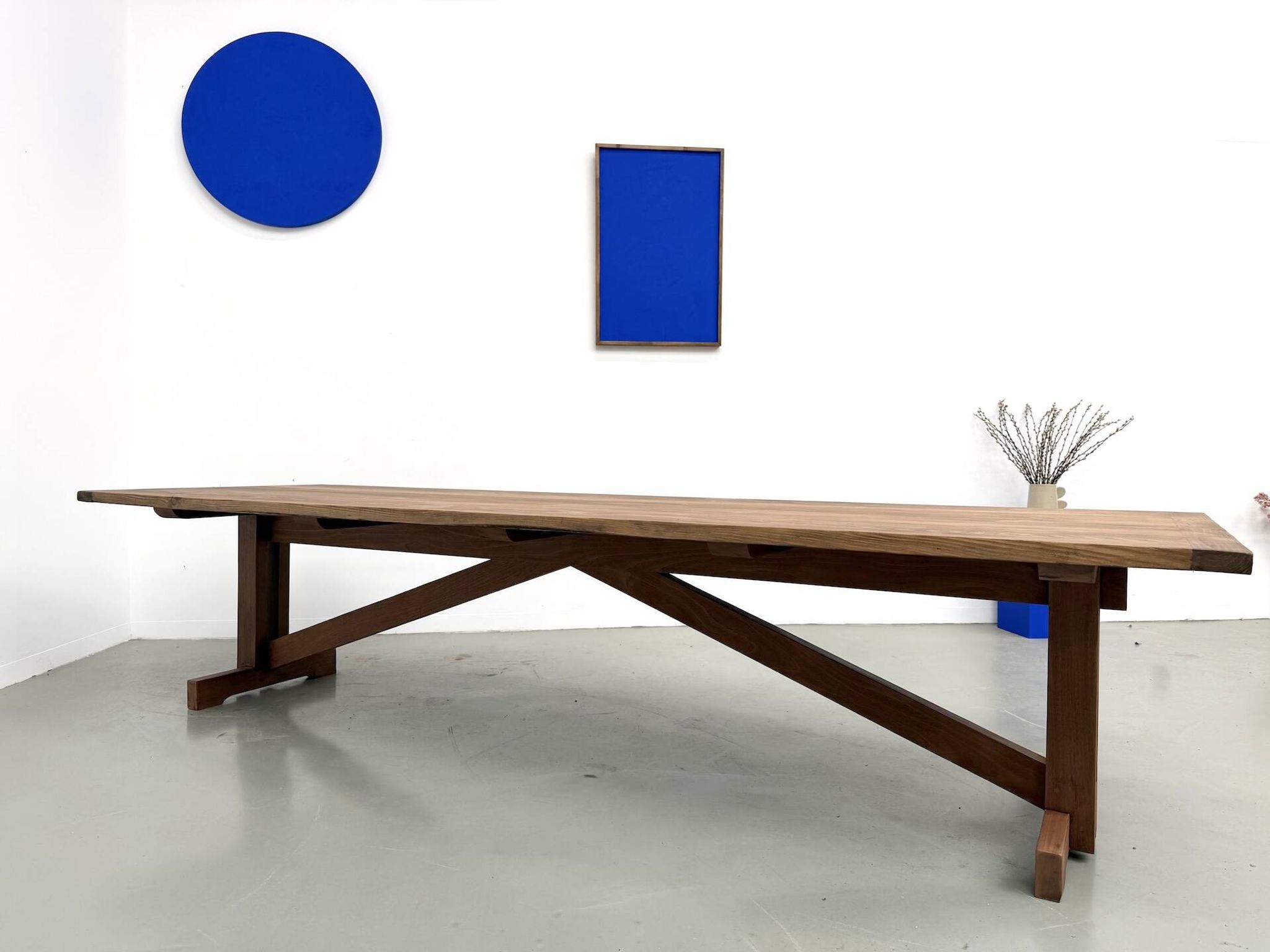 Refectory table in solid pine and beech, with X-shaped legs.