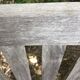Vintage wooden garden bench with wheels