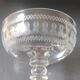 Lot of 4 x Champagne Coupes in Baccarat crystal. Engraved decoration with Greek friezes.
