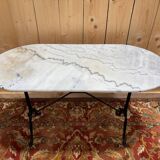 Authentic bistro table with white marble and cast iron from the early 20th century.