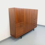 High Scandinavian modernist vintage sideboard in teak and black metal.