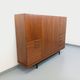 High Scandinavian modernist vintage sideboard in teak and black metal.