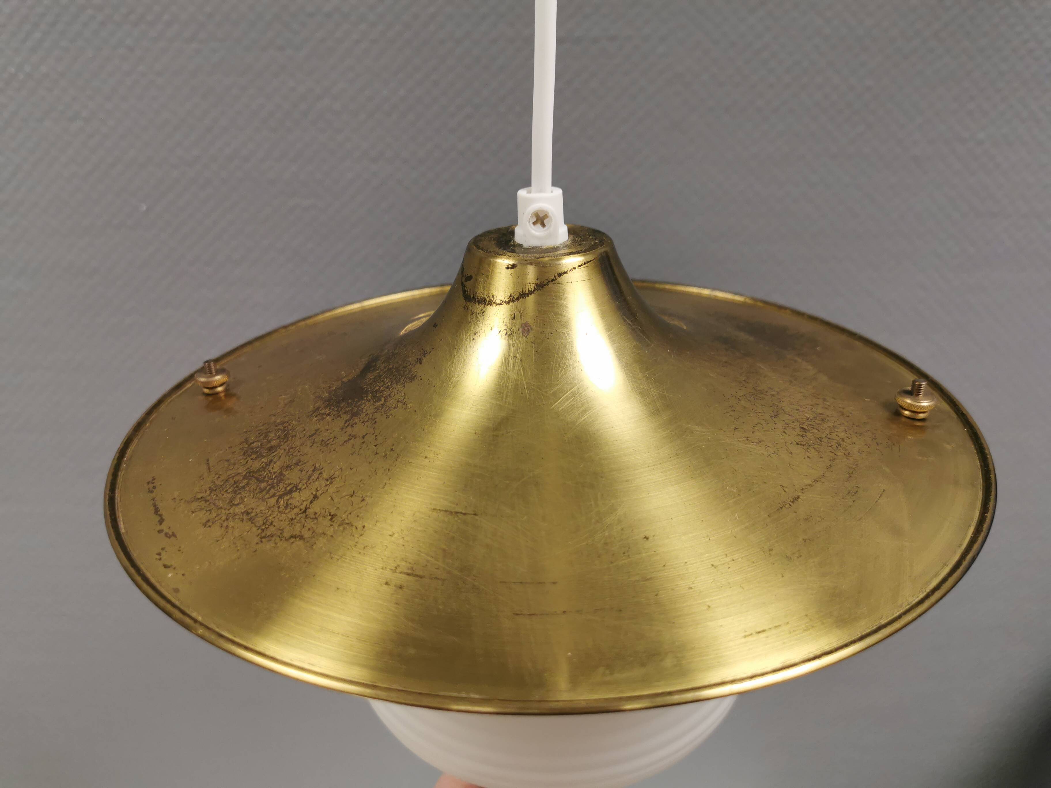 Beautiful older hanging lamp in brass and milky white glass. Germany 1950s