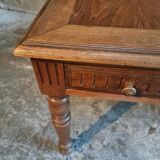 Antique French walnut table with six drawers, parquet top, early 20th century.