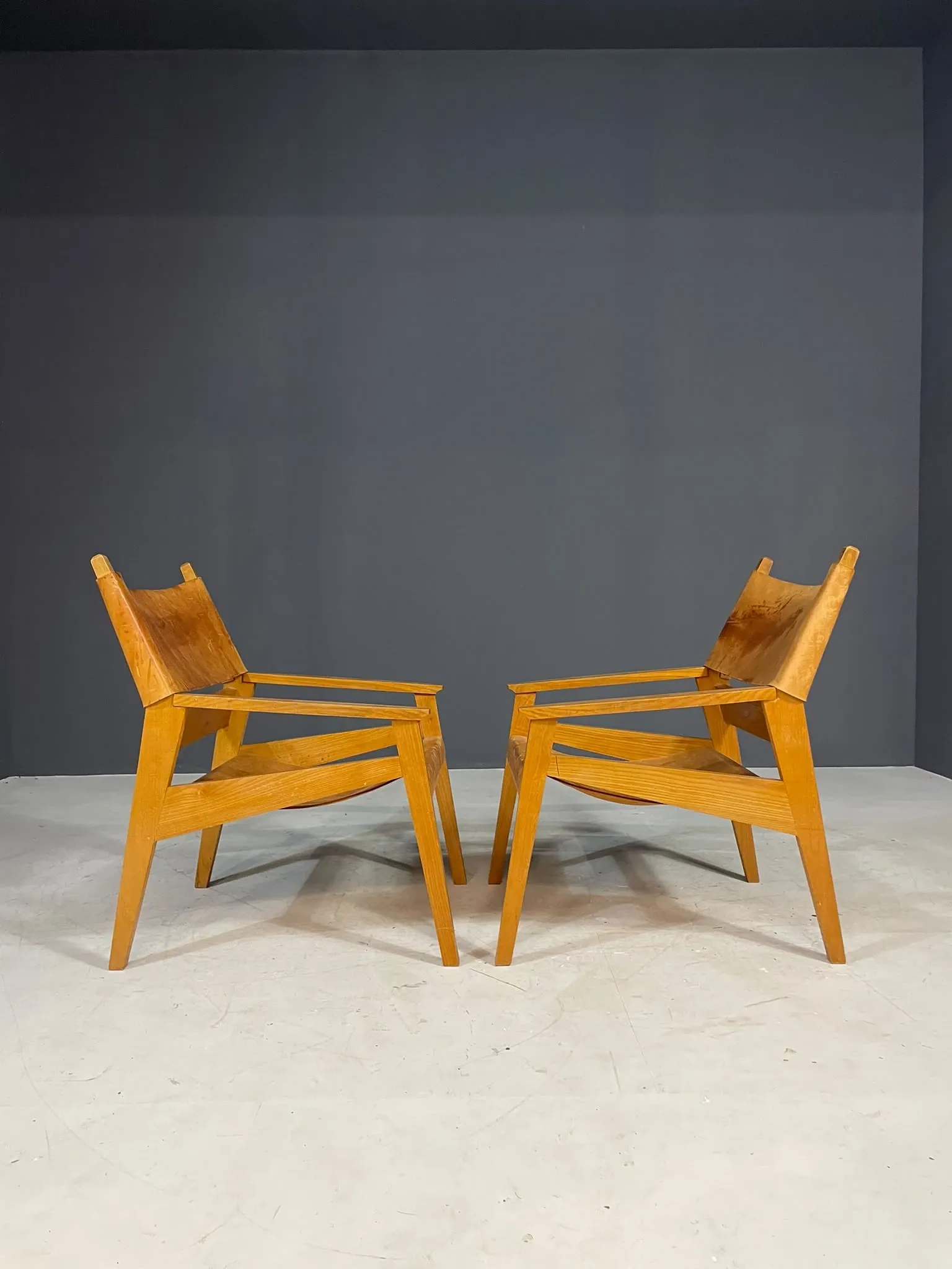 Pair of vintage wooden armchairs with leather upholstery, 20th century, 75 × 56 × 65 cm