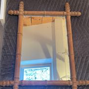 Miroir en bois sculpté façon bambou