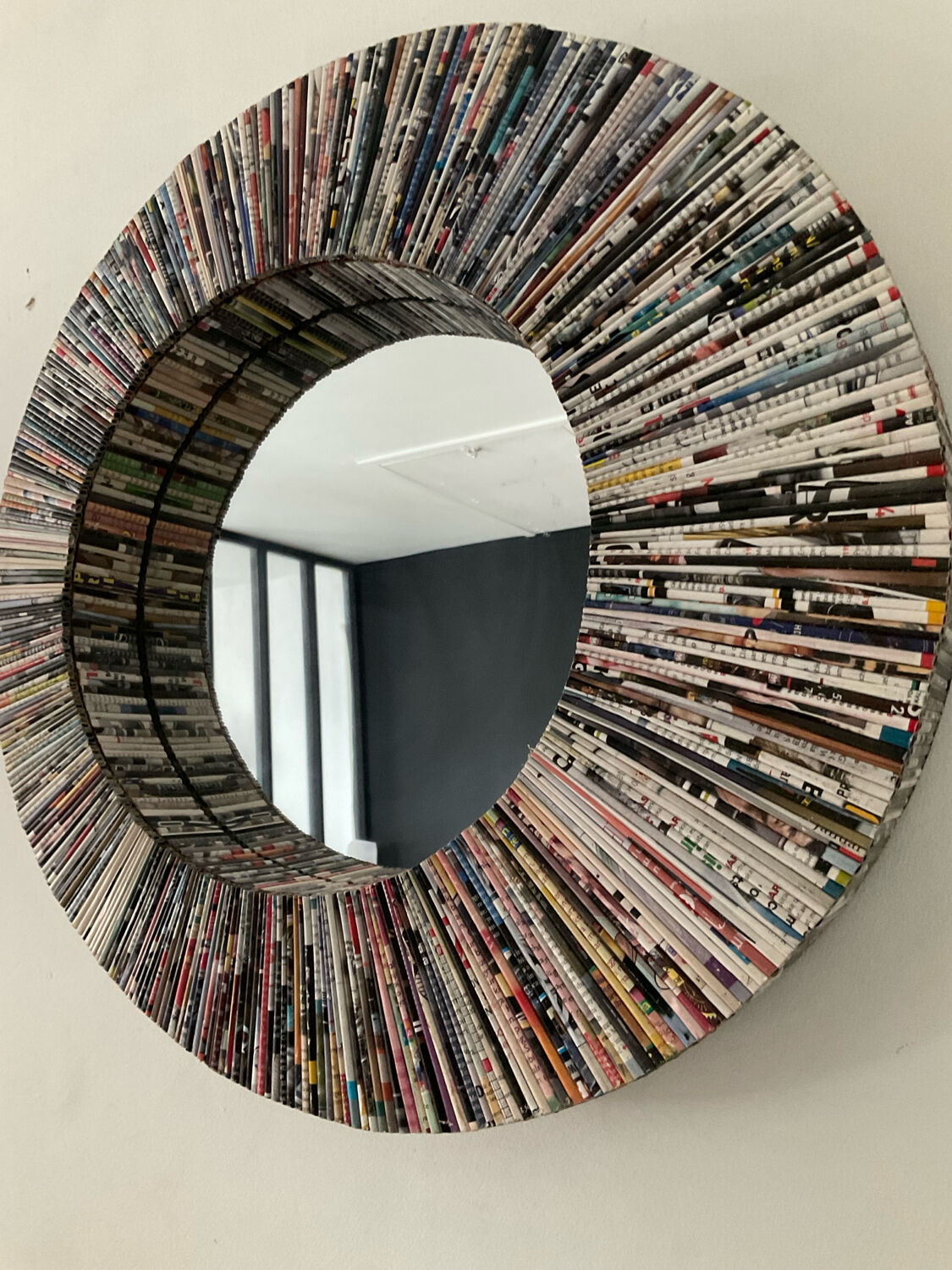 Vintage round mirror made of paper rolls