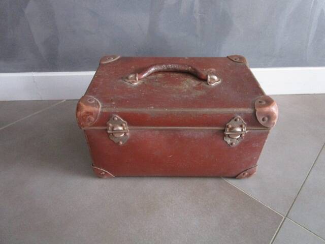 Old cardboard and metal suitcase