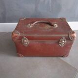 Old cardboard and metal suitcase