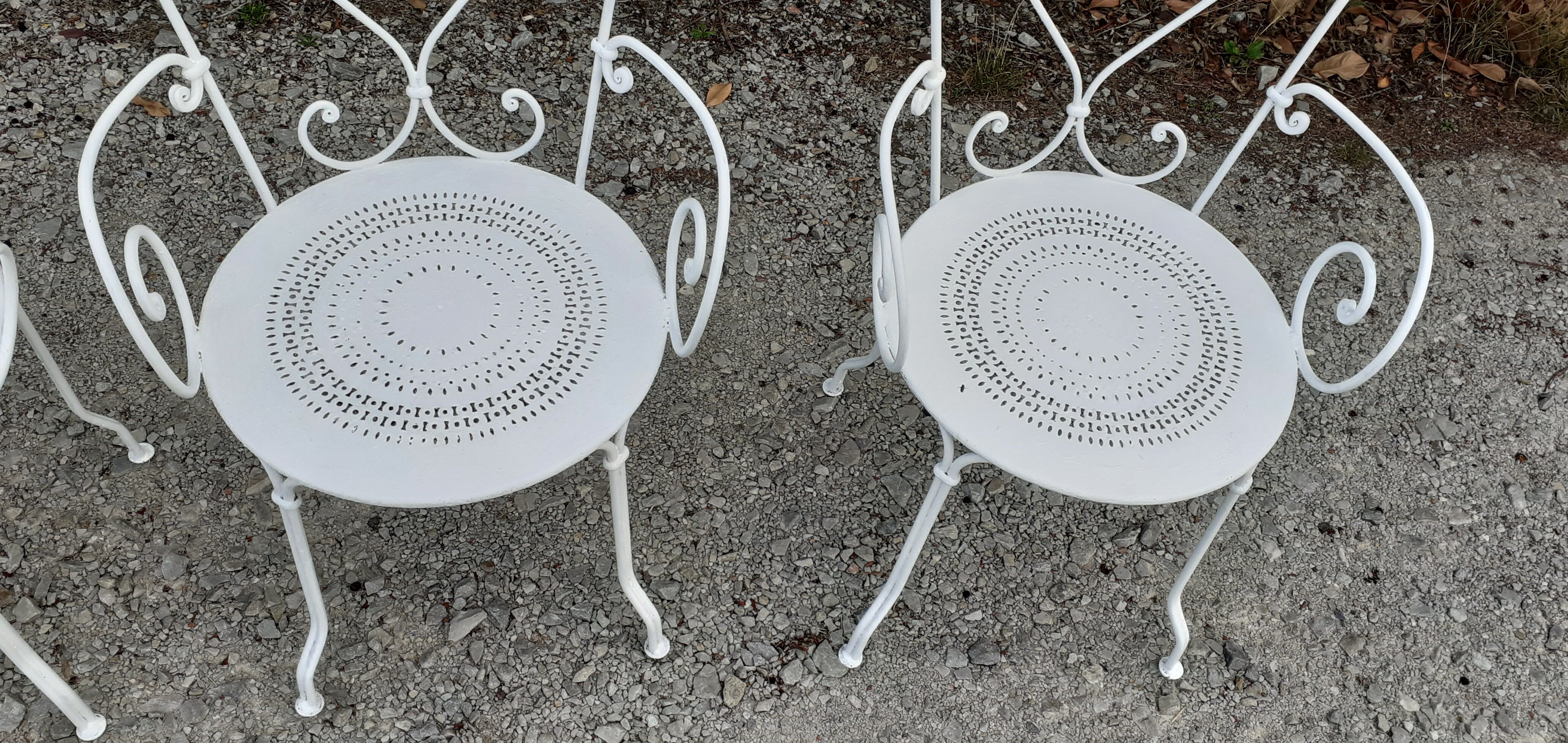 Old white wrought iron garden room
