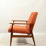Scandinavian design curly orange armchair by H.Lis