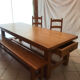 Solid oak dining table made by a craftsman cabinetmaker.