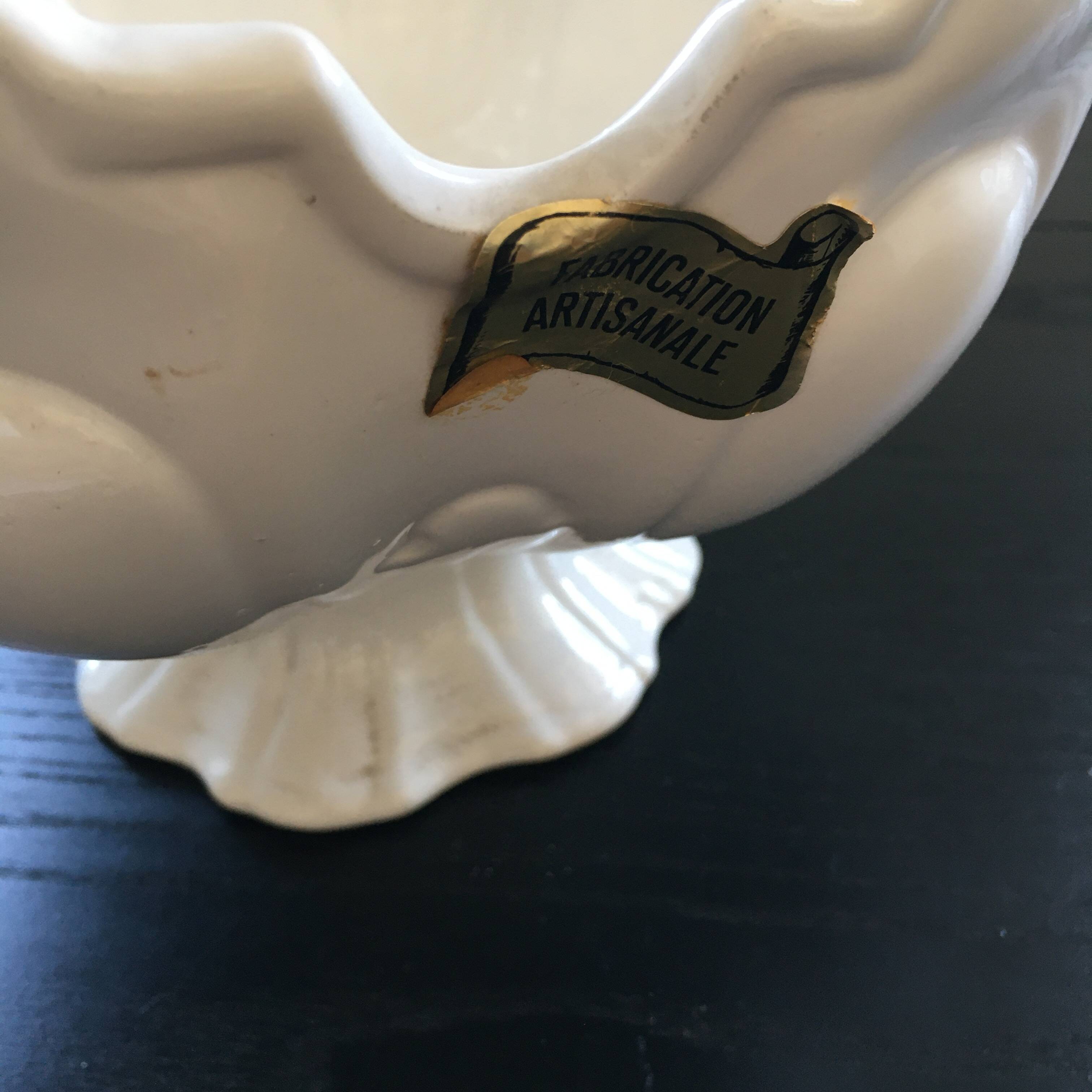 Large white scalloped cup