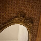 Oval gold knot mirror