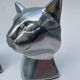 Pair of designer cat head bookends