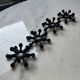 4 "Spider" candle holders by Jens Quistgaard for Dansk Designs, Scandinavian 1960s.