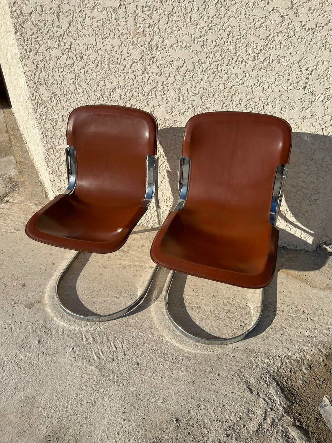 Pair of leather and chromed metal chairs year 70