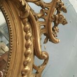 Oval mirror with wooden pediment and gilded stucco oval ice beveled Napoleon III - 80x120cm