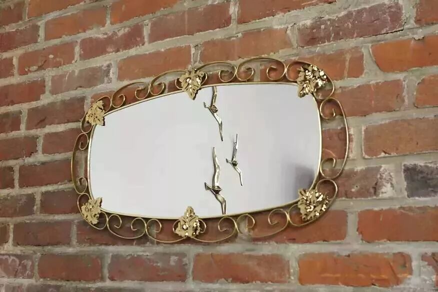 1950s oval brass mirror - 38x69cm