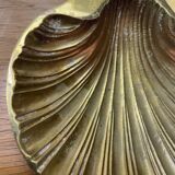 Empty shell pocket in vintage brass