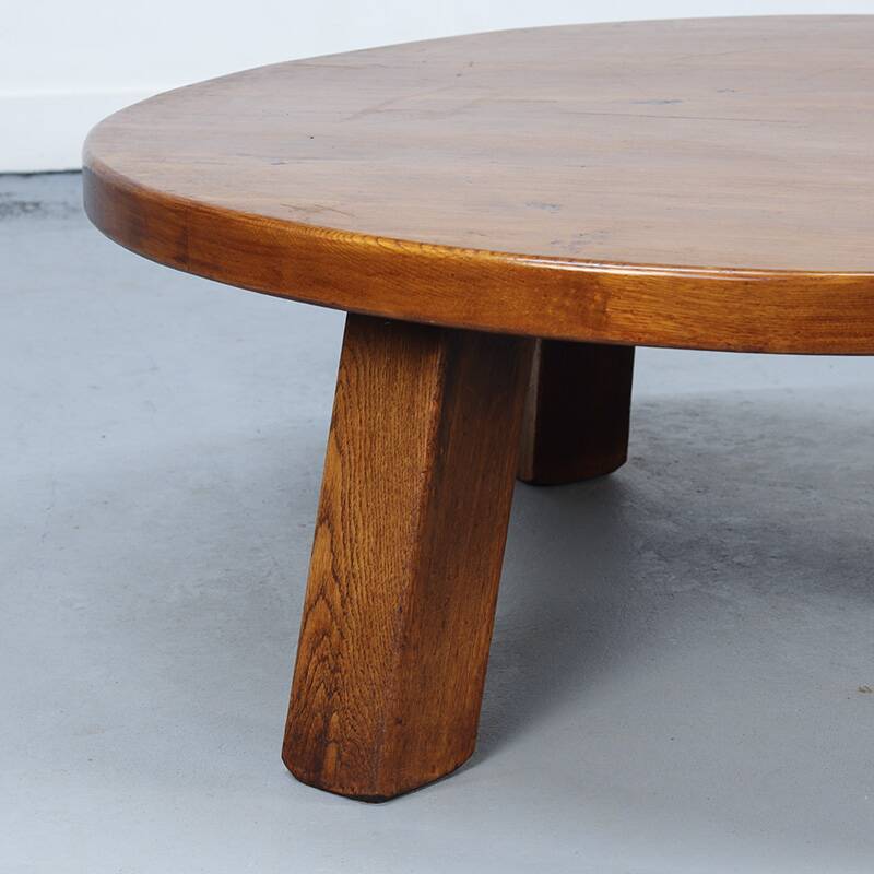 Large vintage round coffee table in raw oak brutalism.