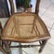Pair of N2 antique caned and wooden chairs from the 1900s.