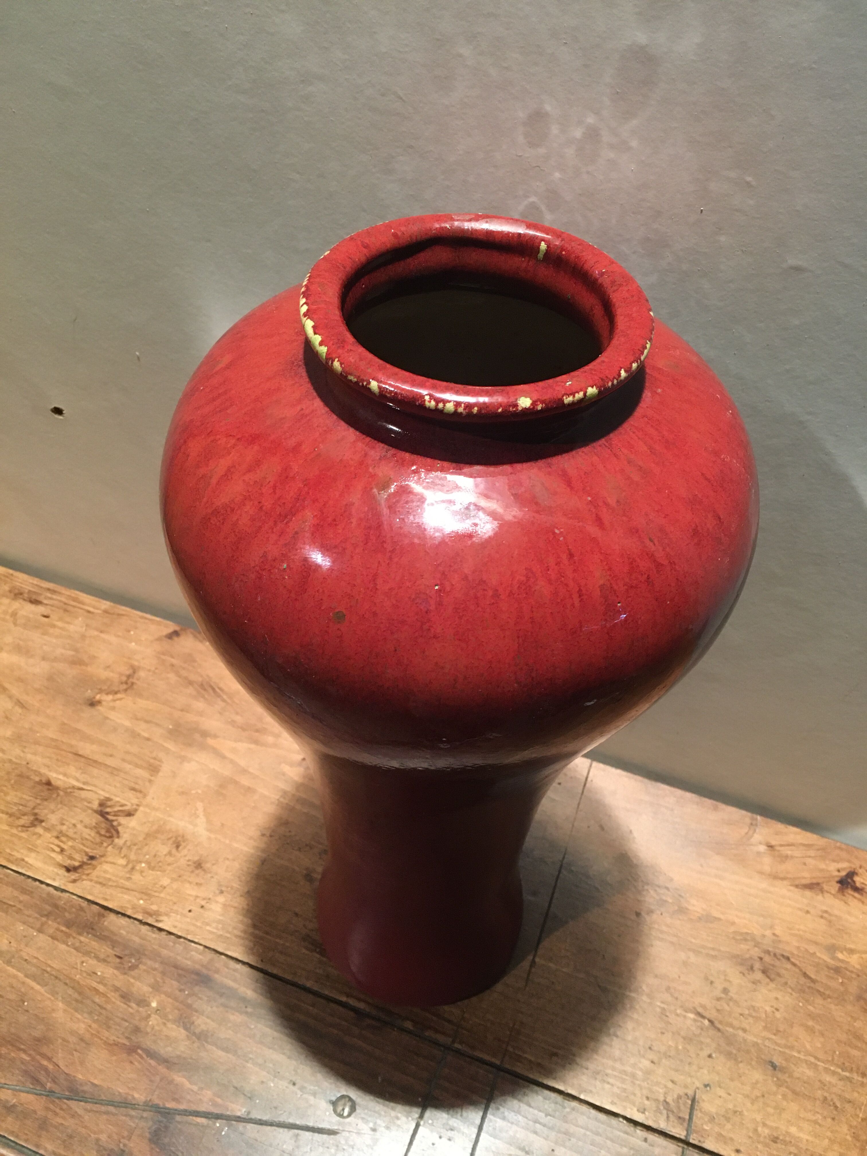 Red ceramic vase