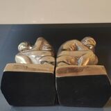 Pair of bookends inspired by Rodin's The Thinker. In gilt bronze