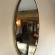 Oval brass mirror, Italy, circa 1960.