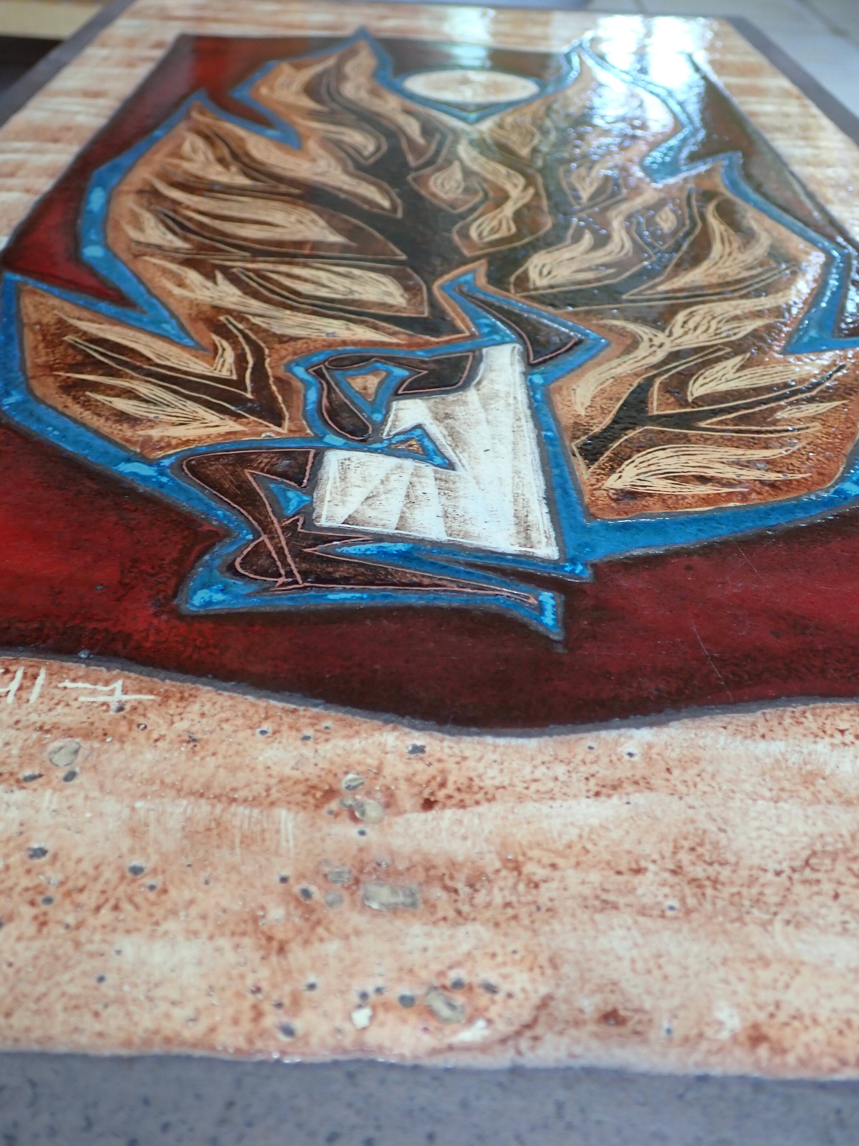 Enameled lava coffee table by Jean Jaffeux