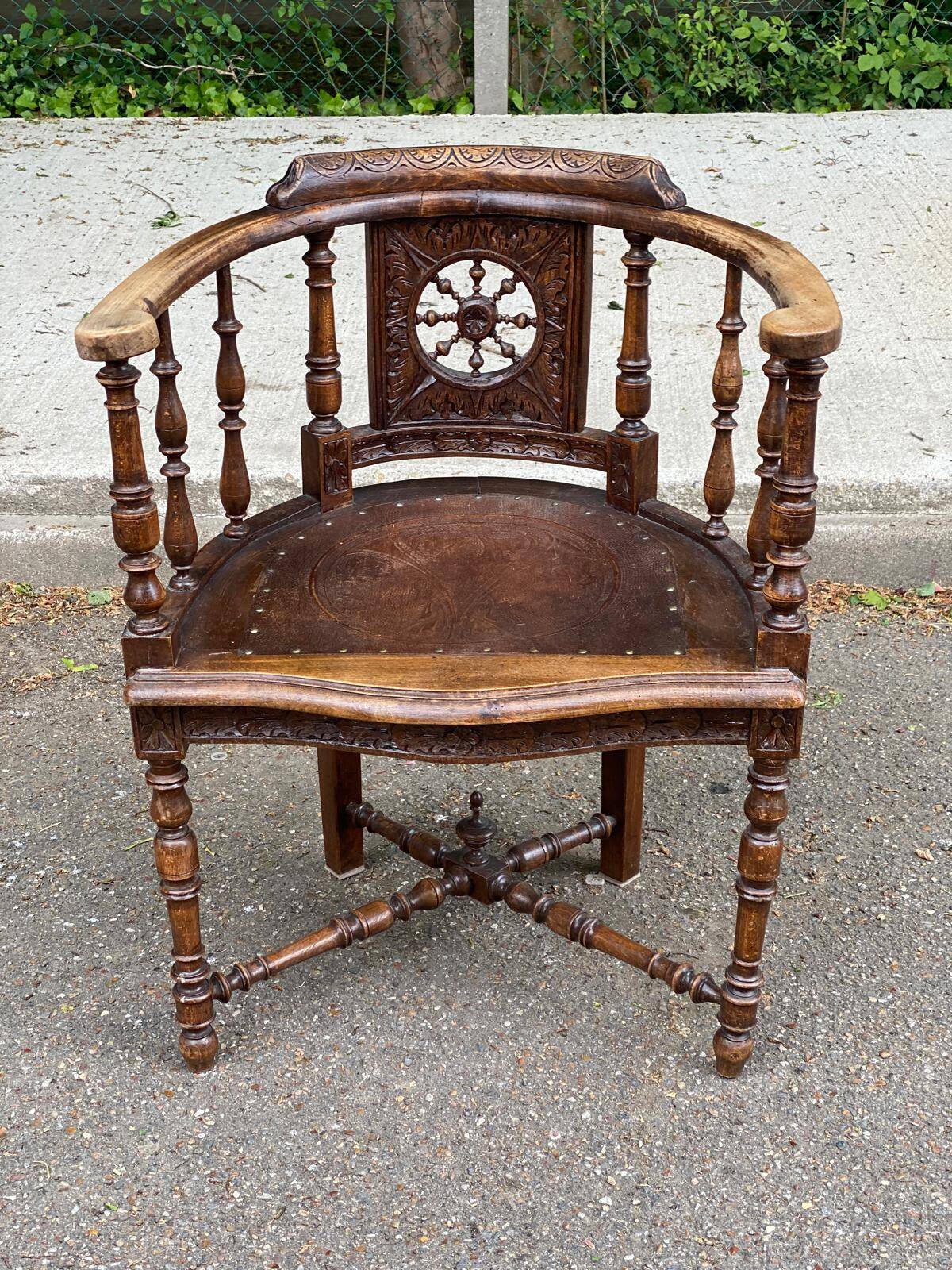 18th century Breton office chair in solid curved and carved wood
