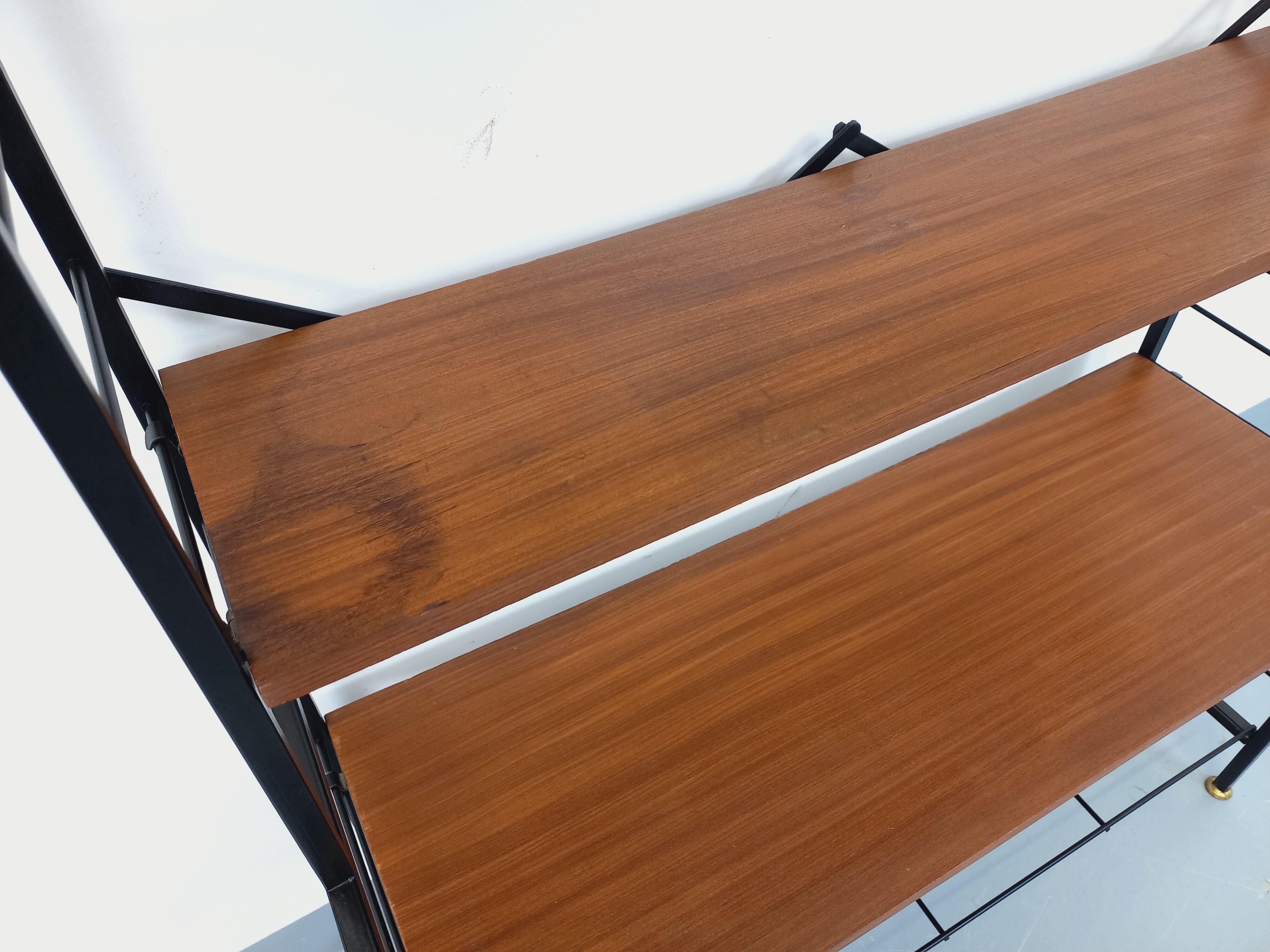 Vintage Italian bookshelf in teak and metal from the 1960s.