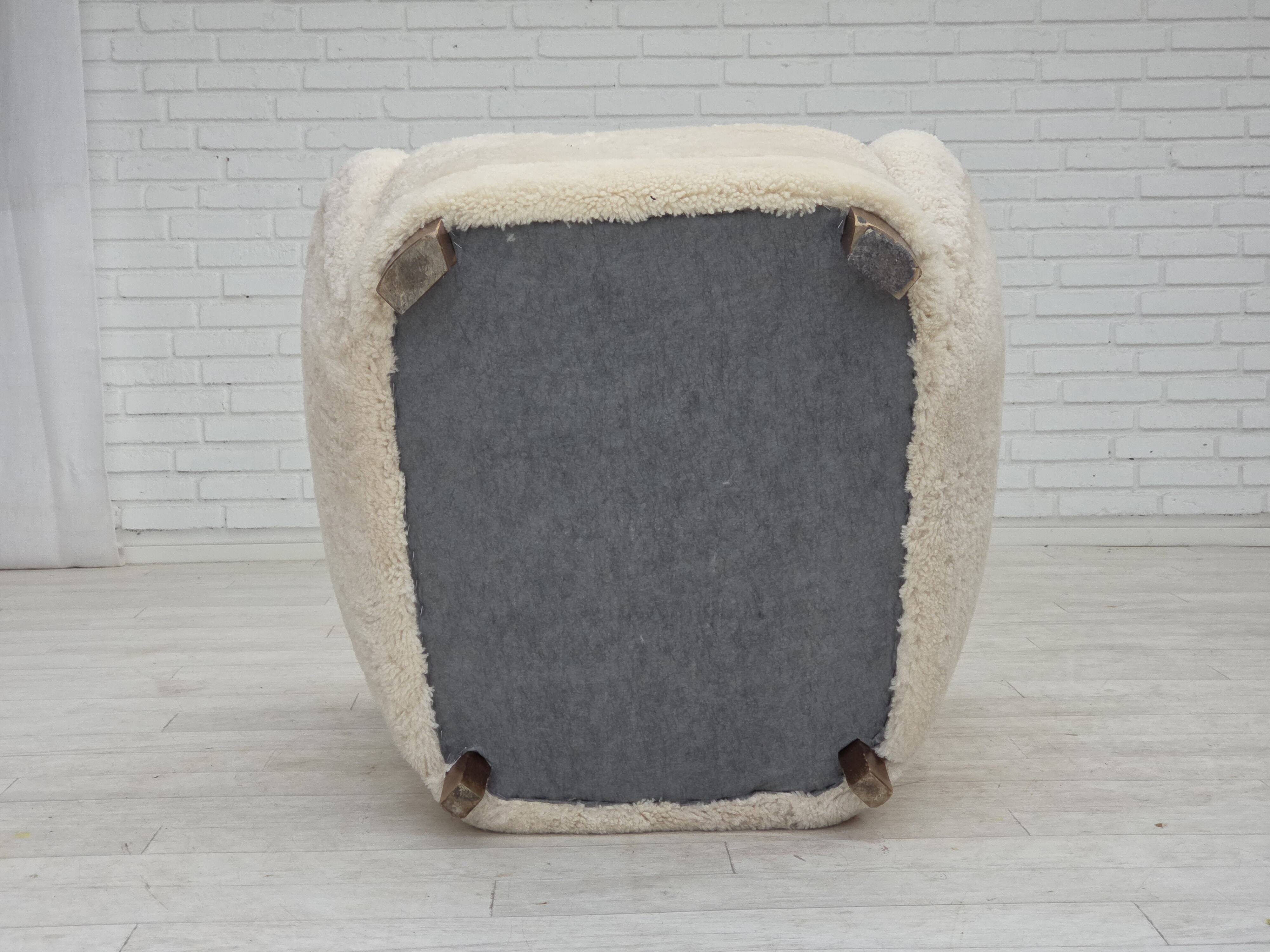 1960s, Danish design, reupholstered highback armchair, genuine sheepskin.