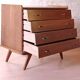 Vintage slanted commode with tapered legs from the 1960s in golden oak.