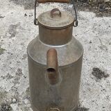 Old doe vintage zinc milk jug type watering can with its spout / neck