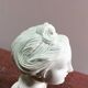Plaster sculpture young woman with headband 1910