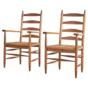 Set of 2 oak and wicker armchairs, mid-20th century.