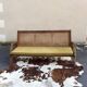 Cane-seated teak bench