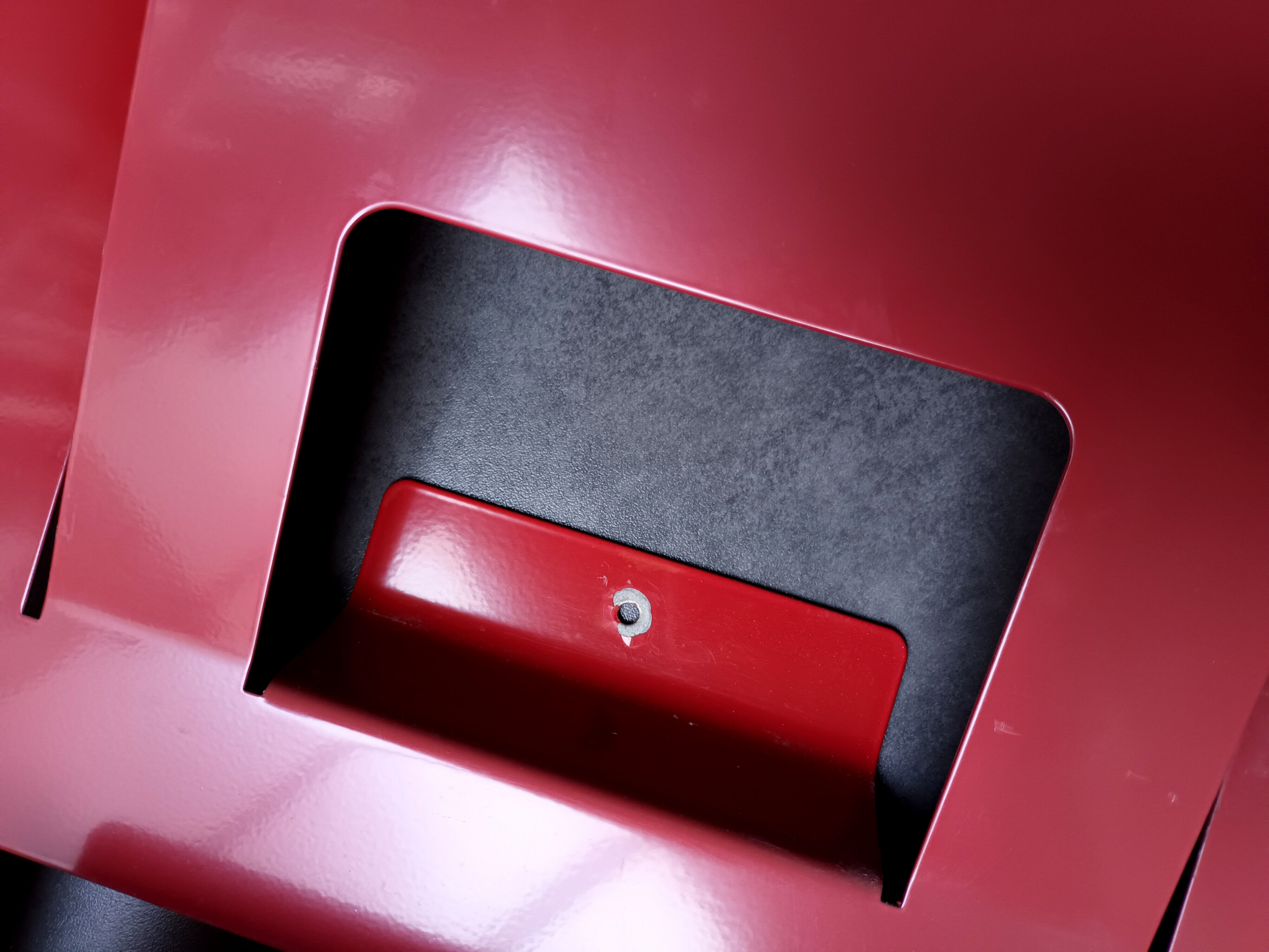 Vintage red metal wall magazine rack