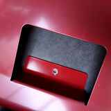 Vintage red metal wall magazine rack