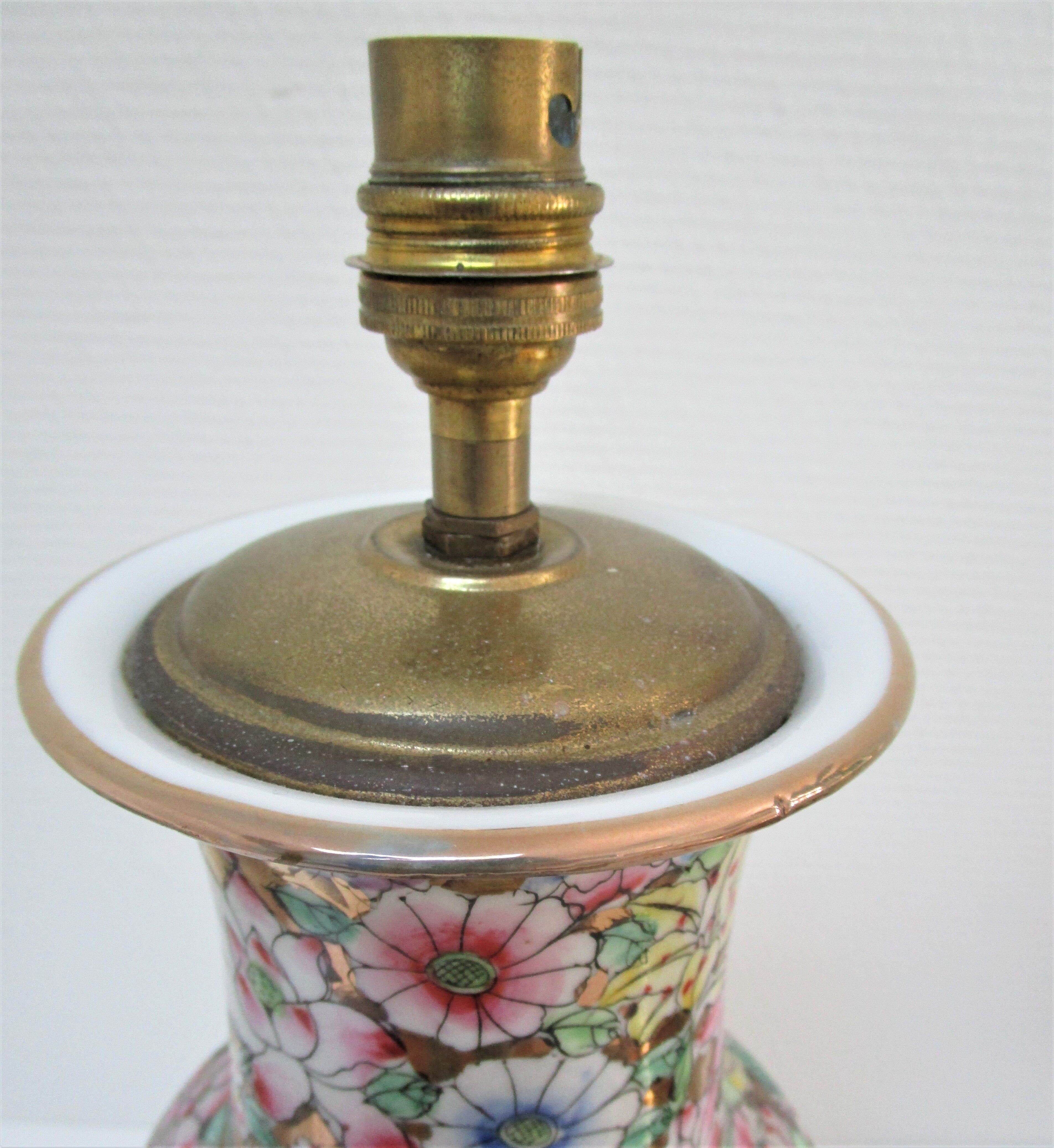 Chinese porcelain lamp foot with polychrome decoration of vintage flowers