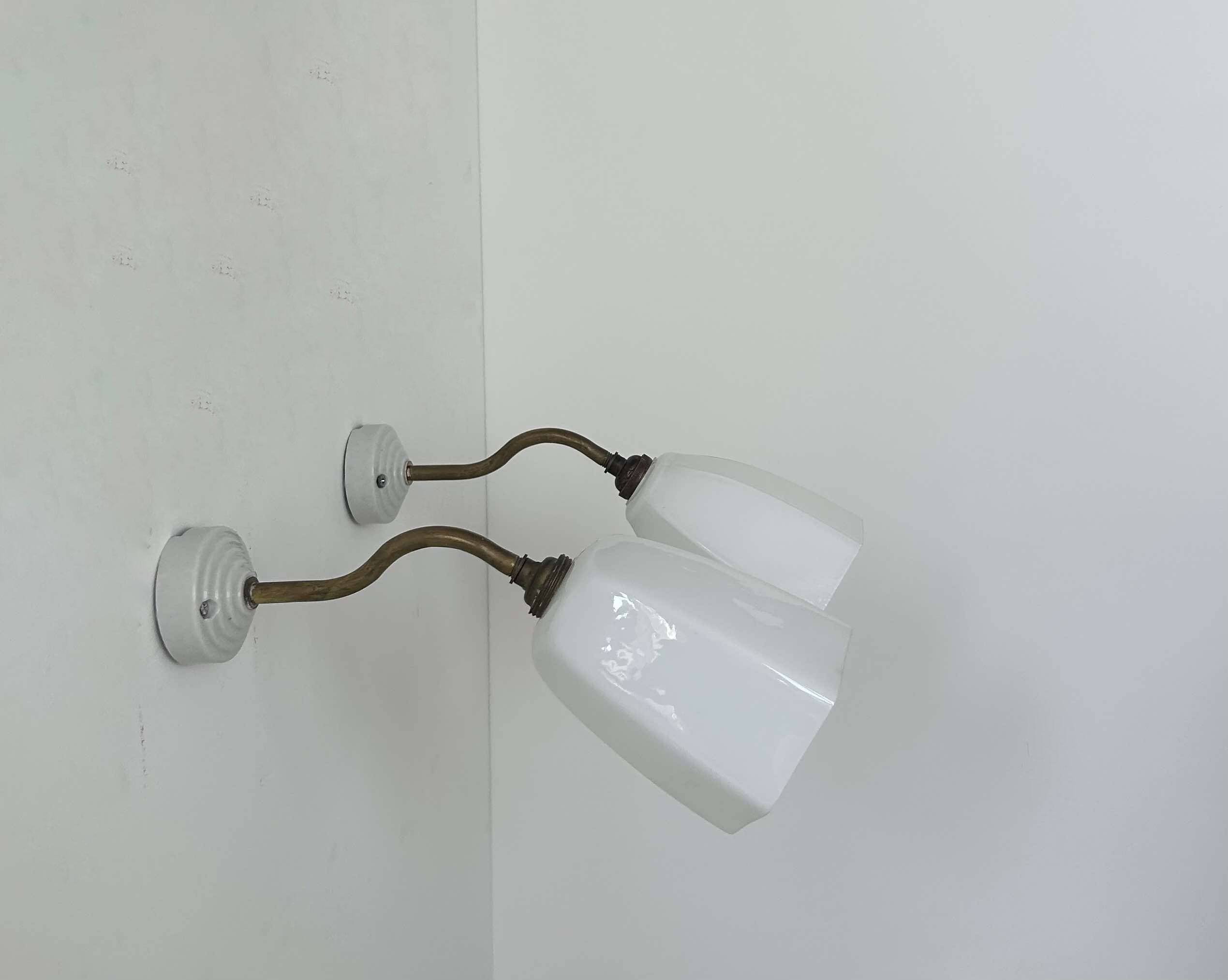 Pair of brass and opaline wall lights, France 1930