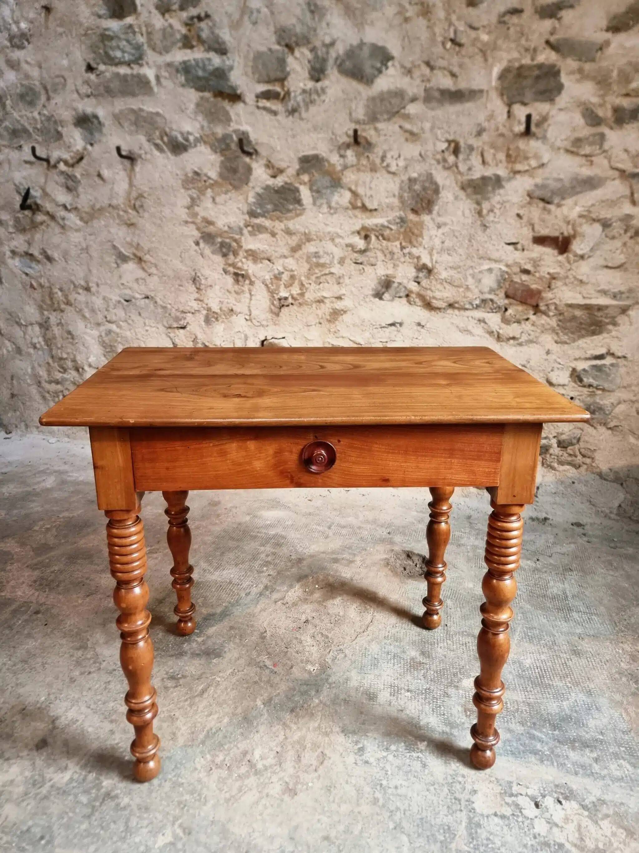 Small antique French writing table in walnut with a drawer, around 1900.
