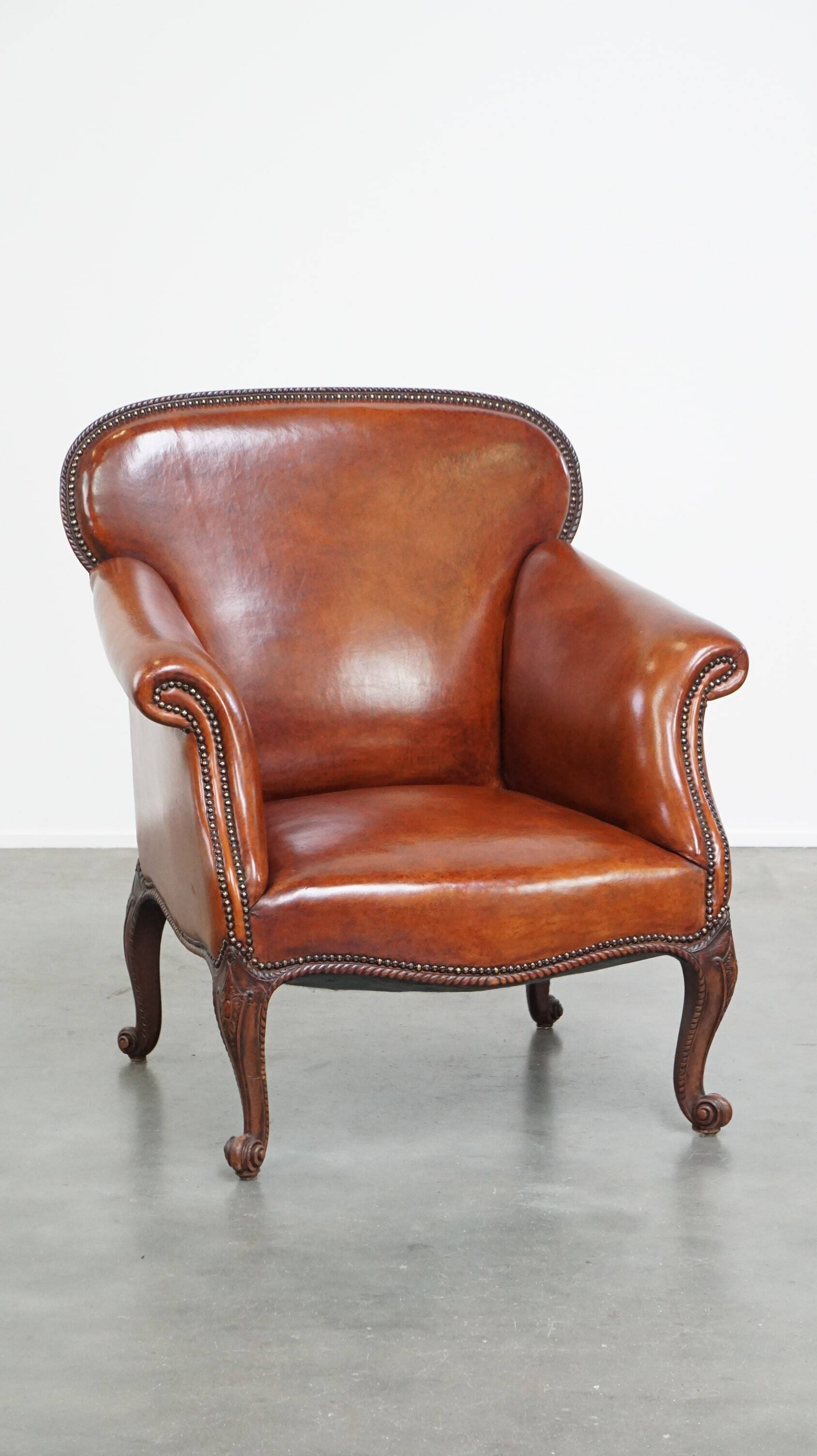 Fully restored antique sheepskin armchair