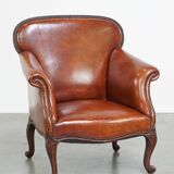 Fauteuil ancien en peau de mouton entièrement restauré
