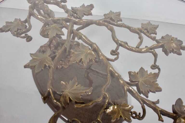 Sculptural bronze and glass coffee table