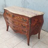 Louis XV curved chest of drawers in rosewood marquetry