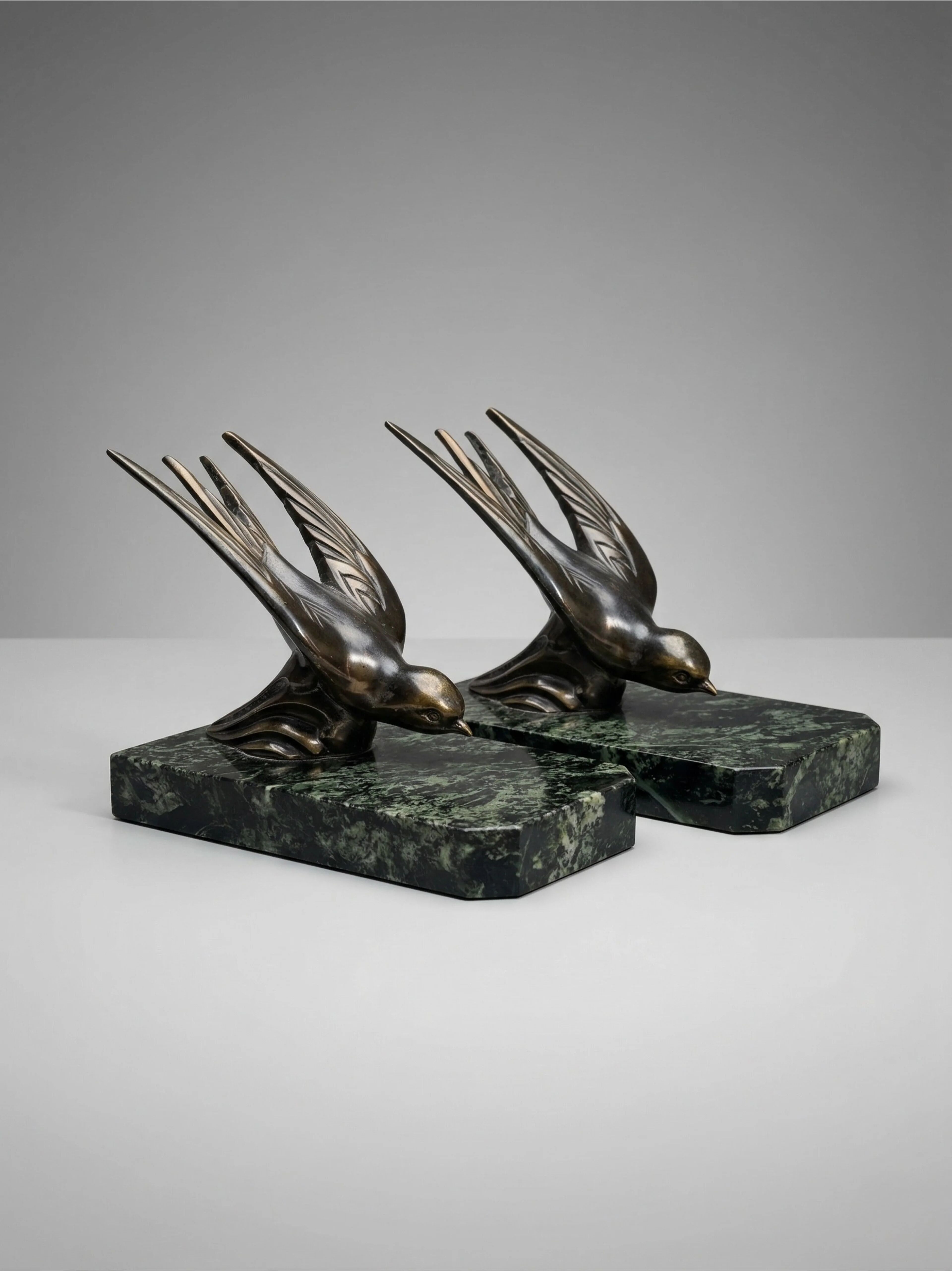 Art Deco bookends – Swallows in spelter on marble bases